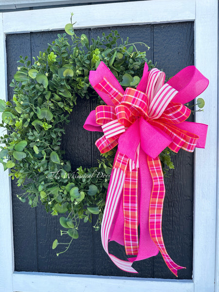 Boxwood wreath with pink plaid bow