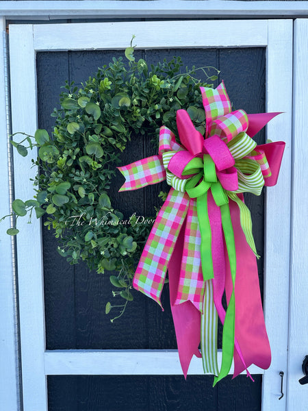 Boxwood wreath with oversized bow